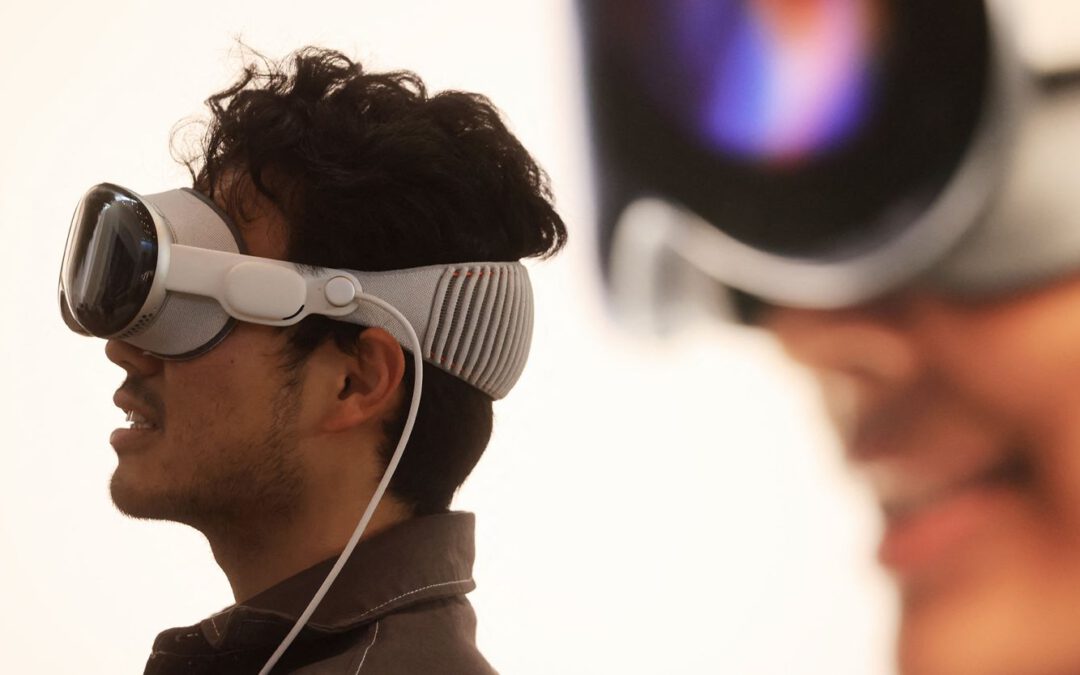 A customer tries his Vision Pro at the launch of the Apple Vision Pro at Apple The Grove in Los Angeles, California, on February 2, 2024.